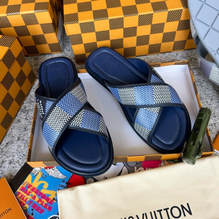 Luxury sandals with a modern, chic design. Featuring a bold blue and white checkered pattern, these sandals are the perfect choice for any wardrobe.