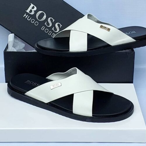 Shop Boss Hugo Boss Slides on our eCommerce platform. Browse through our selection of stylish and comfortable sandals, including the Boss Hugo Boss Slides. Add these to your cart today and enjoy the best of Nigerian fashion.