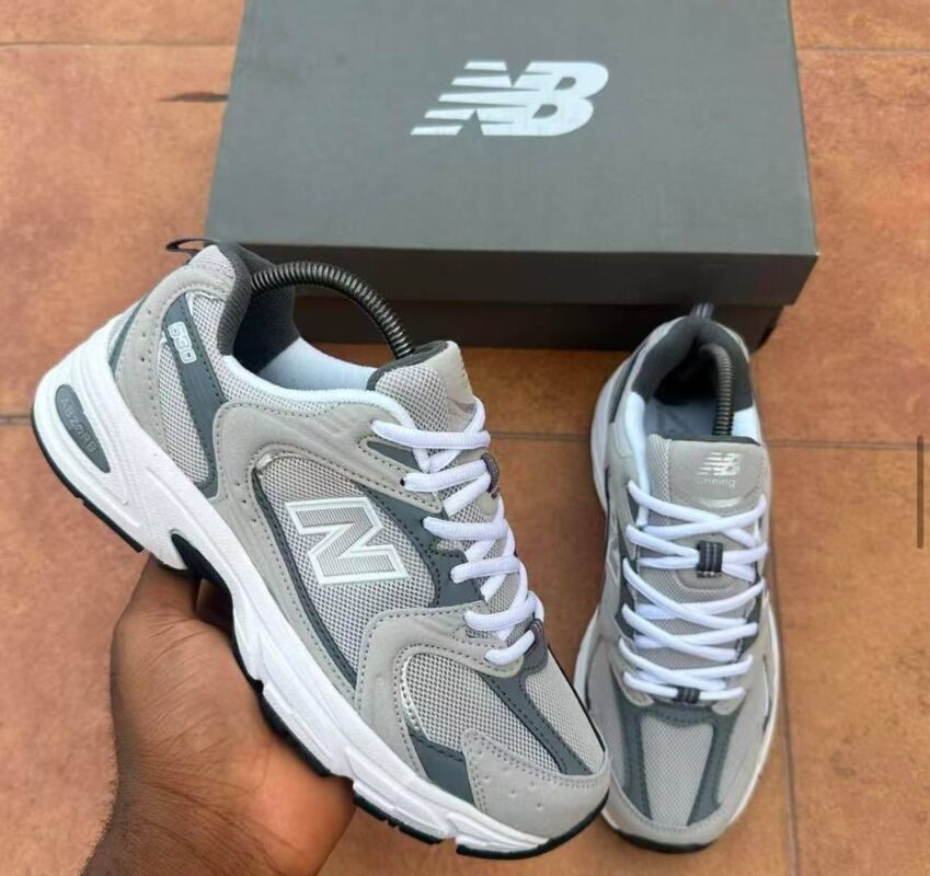 Sneakers in a gray and white colorway, perfect for everyday wear or special occasions. Designed for comfort and style, the New Balance 800 is a must-have for any Nigerian shopper.