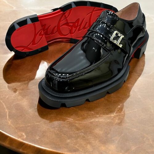 Sleek and luxurious, the Christian Louboutin Leather Men’s Loafer combines timeless elegance with bold, designer appeal.