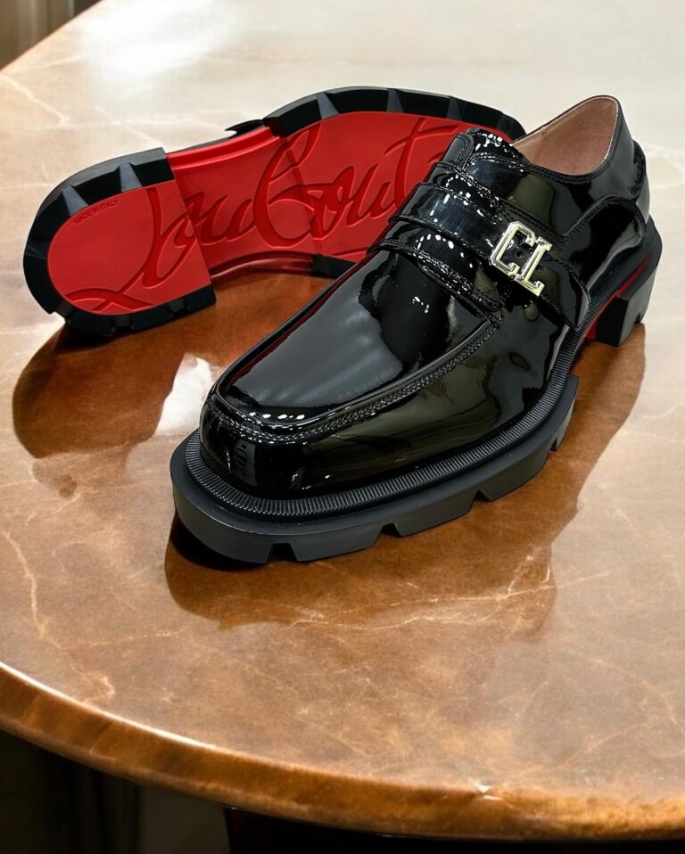 Sleek and luxurious, the Christian Louboutin Leather Men’s Loafer combines timeless elegance with bold, designer appeal.