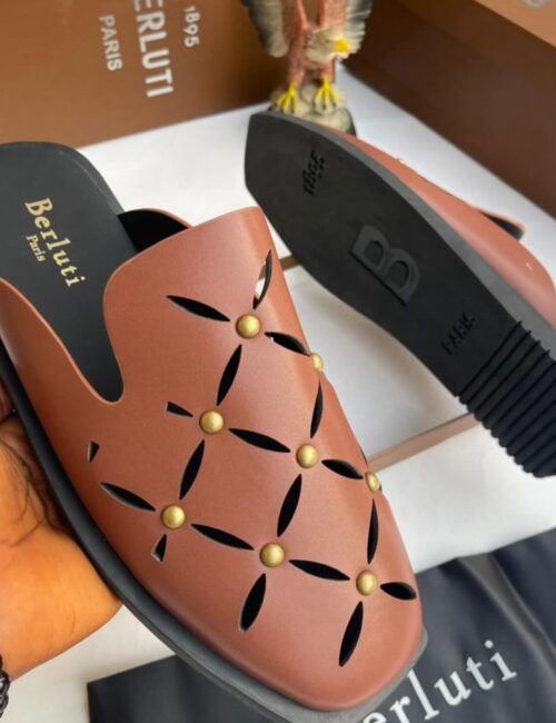 Handcrafted excellence defines the Brown Berluti Leather Half-Shoe — a refined slip-on for the discerning gentleman.