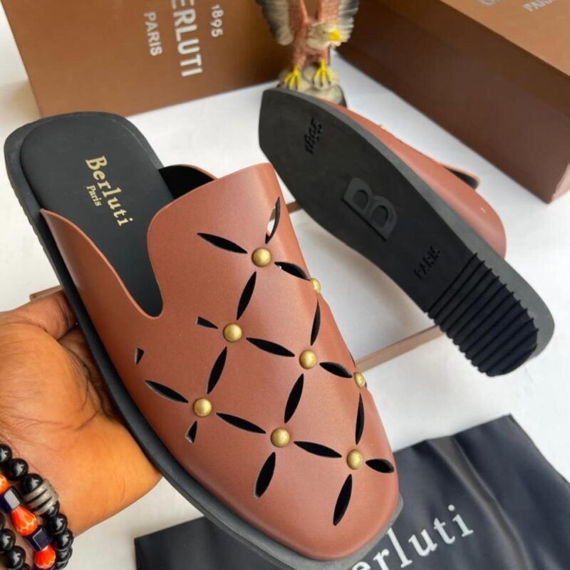 Handcrafted excellence defines the Brown Berluti Leather Half-Shoe — a refined slip-on for the discerning gentleman.