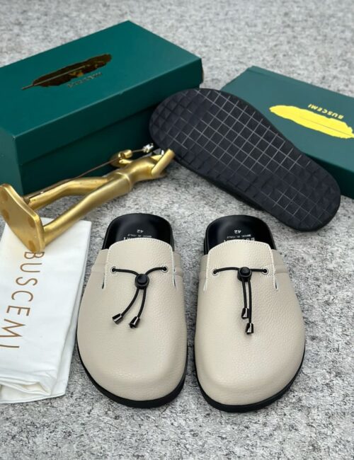 Effortlessly luxe, the Buscemi Slip-On Shoes combine minimalist design with elevated craftsmanship.