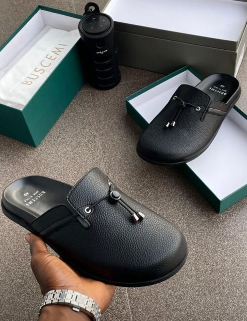 Effortlessly luxe, the Buscemi Slip-On Shoes combine minimalist design with elevated craftsmanship.