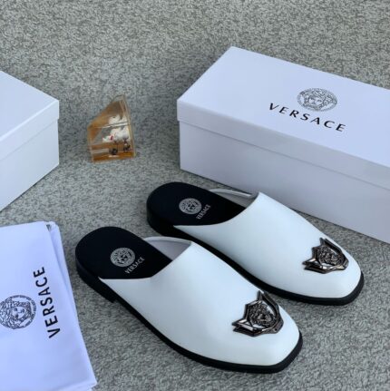 Sophisticated and daring, the Black Versace Leather Half-Shoe redefines luxury with bold design and premium craftsmanship.