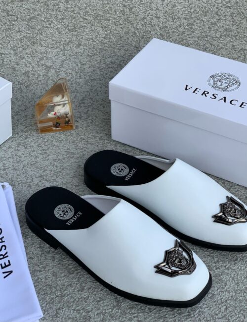 Sophisticated and daring, the Black Versace Leather Half-Shoe redefines luxury with bold design and premium craftsmanship.