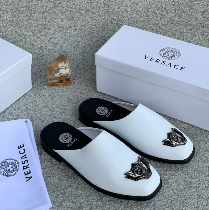 Sophisticated and daring, the Black Versace Leather Half-Shoe redefines luxury with bold design and premium craftsmanship.