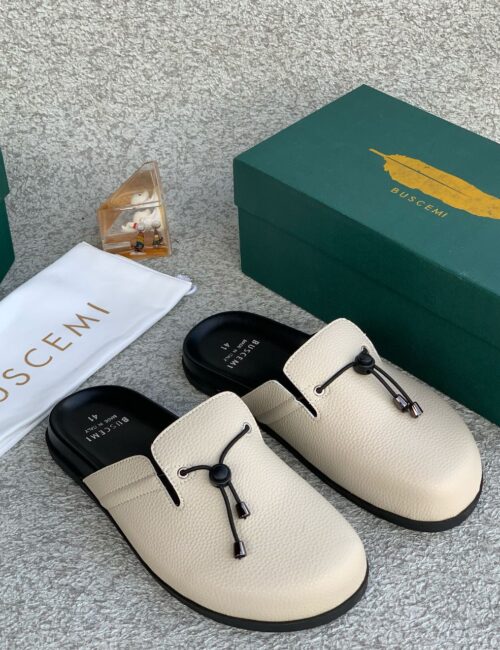 Effortlessly luxe, the Buscemi Slip-On Shoes combine minimalist design with elevated craftsmanship.