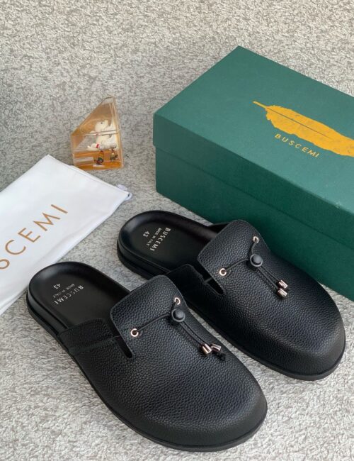 Effortlessly luxe, the Buscemi Slip-On Shoes combine minimalist design with elevated craftsmanship.