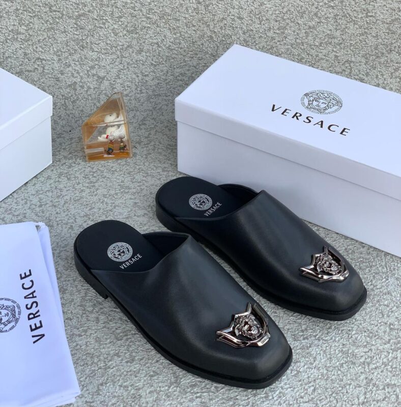 Sophisticated and daring, the Black Versace Leather Half-Shoe redefines luxury with bold design and premium craftsmanship.