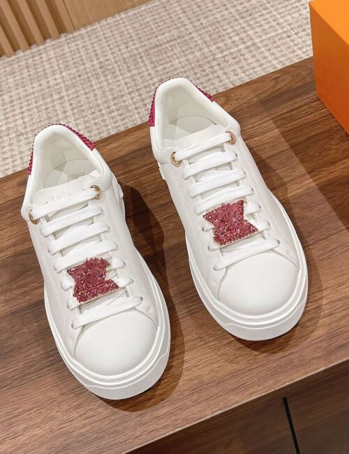 Louis Vuitton Time Out sneaker with a red and white diamond-encrusted logo, perfect for any occasion. Available in various sizes and styles.