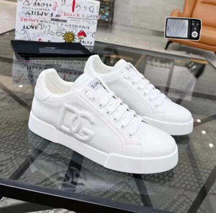 The White D&G Leather Sneaker delivers Italian luxury with crisp, minimalist style. Crafted from premium white leather with subtle branding, it’s a versatile staple for elevated casual wear.