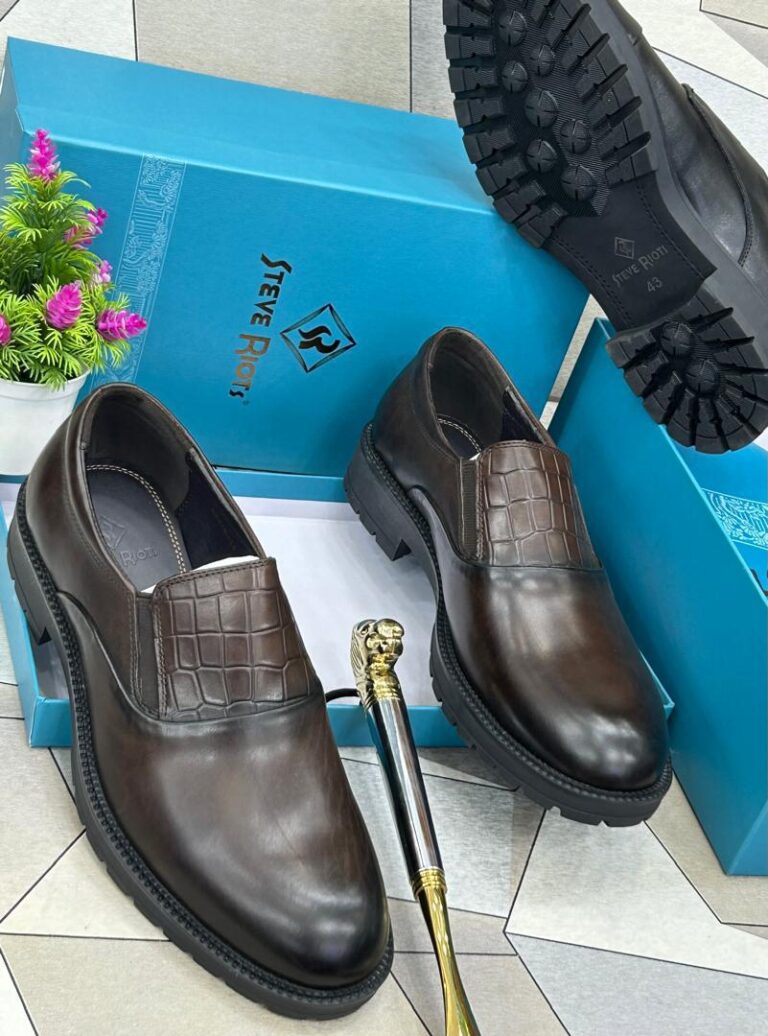 The Brown Steve Riotti Leather Shoe offers timeless Italian craftsmanship with a modern edge, featuring rich brown leather and effortless sophistication for versatile styling.