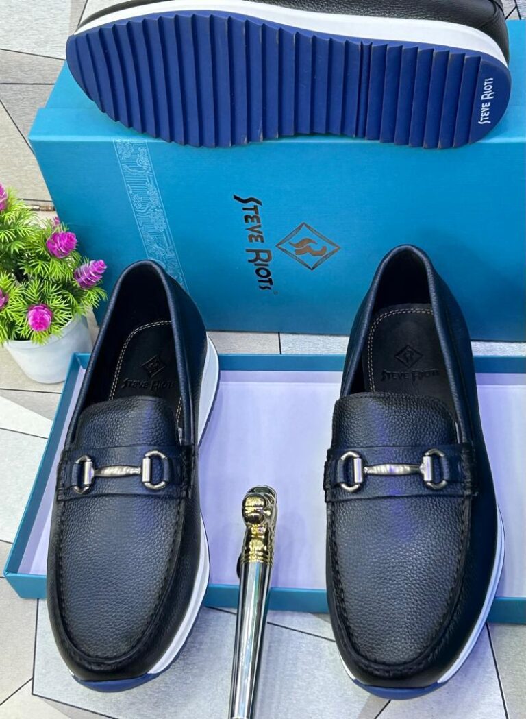 The Steve Riots Men's Loafer delivers bold contemporary style with its sleek silhouette and premium construction, perfect for fashion-forward sophistication.