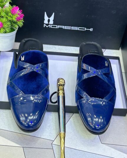 The Moreschi men's mules blend Italian sophistication with modern comfort, featuring a sleek slip-on design crafted from premium leather for effortless style.