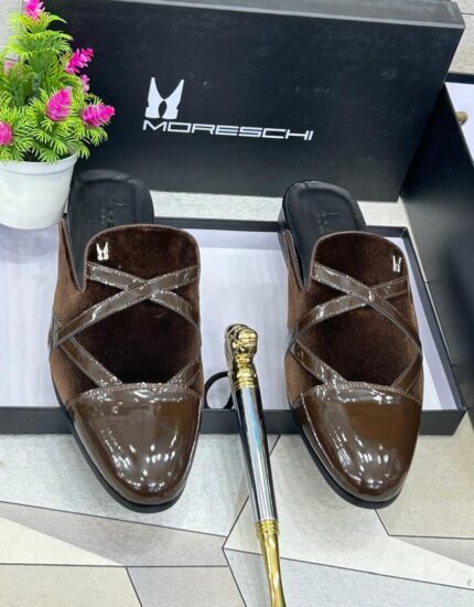 The Moreschi men's mules blend Italian sophistication with modern comfort, featuring a sleek slip-on design crafted from premium leather for effortless style.