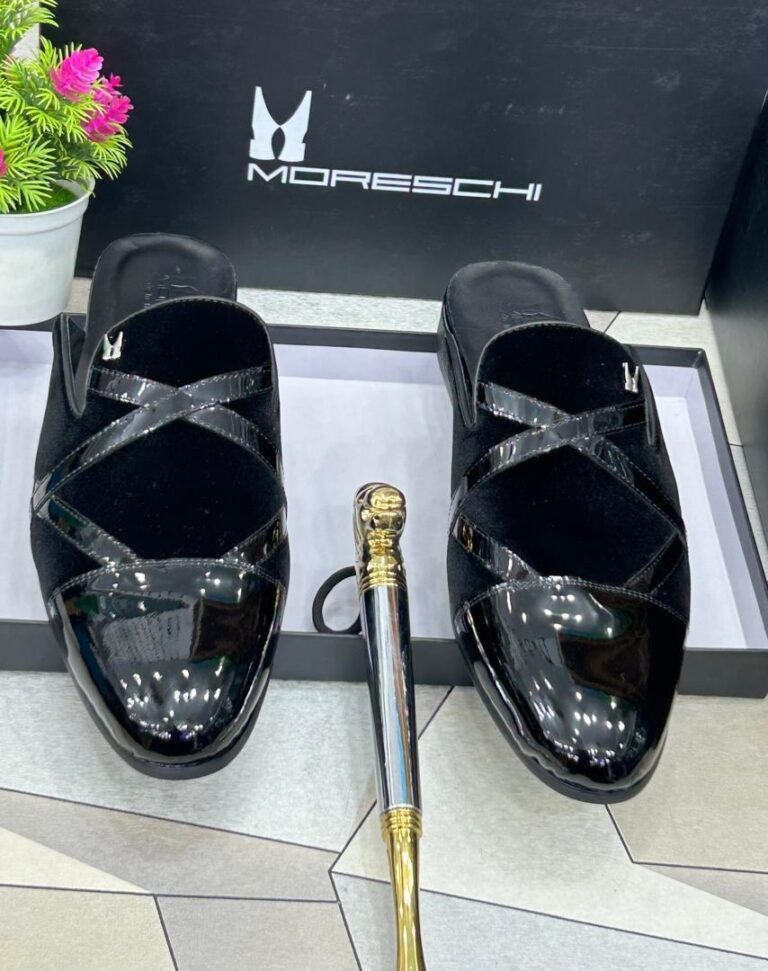 The Moreschi men's mules blend Italian sophistication with modern comfort, featuring a sleek slip-on design crafted from premium leather for effortless style.
