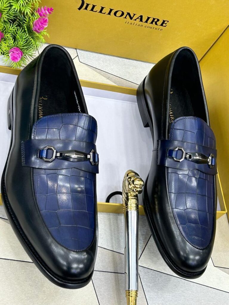 The Blue ILLIONAIRE Italian Loafer combines bold style with premium craftsmanship, featuring a rich blue hue and sleek silhouette for a sophisticated yet statement-making look.