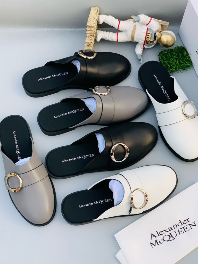 Sneakers and loafers in various colors and styles, showcasing the brand's diverse product line. The image is optimized for Nigerian viewers, highlighting the brand's international presence and quality.