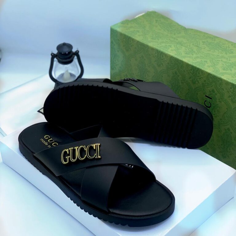 Sneakers, loafers, and slip-ons in black color with gold lettering. Designed for Nigerian shoppers.